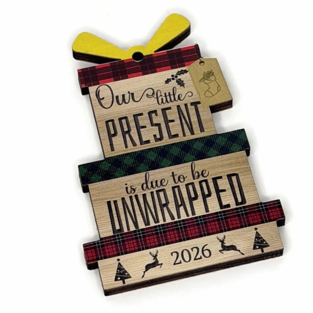 Wooden Ornament “Our Little Present is Due to be Unwrapped 2026”